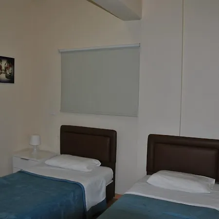 Les Palmiers City Center House *